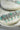 Jhanvi Choker Necklace Set - Silver & Gem Variations featuring cushion-cut AD stones with mint green teardrop accents, includes matching earrings.