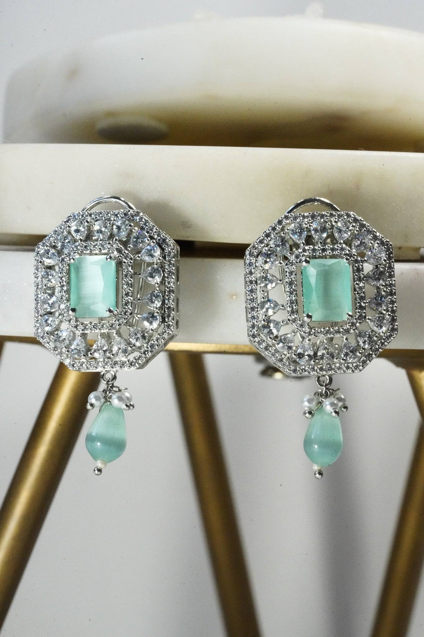 Jhanvi Choker Necklace Set - Silver & Gem Variations featuring cushion-cut AD stones with mint green teardrop accents, includes matching earrings.
