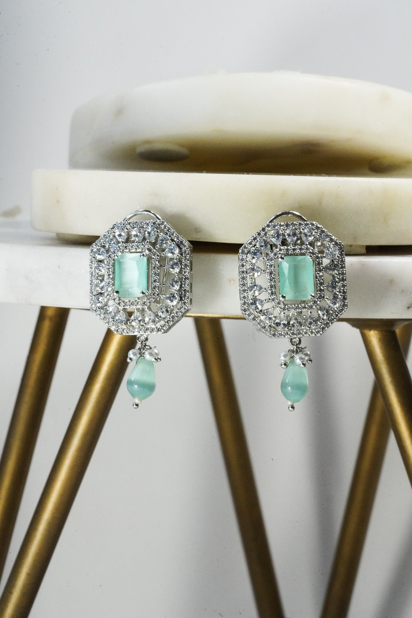 Jhanvi Choker Necklace Set - Silver & Gem Variations featuring cushion-cut AD stones with mint green teardrop accents, includes matching earrings.