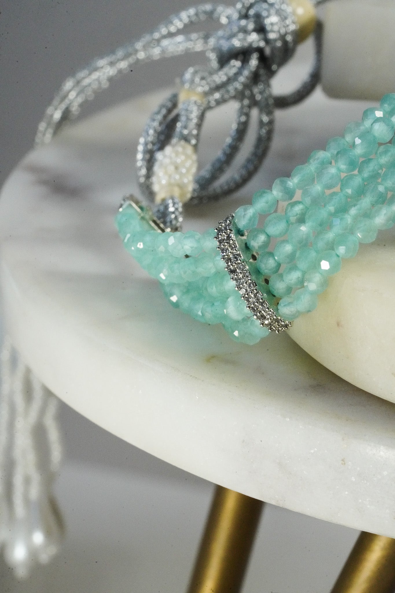 Jhanvi Choker Necklace Set - Silver & Gem Variations featuring cushion-cut AD stones with mint green teardrop accents, includes matching earrings.