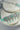 Jhanvi Choker Necklace Set - Silver & Gem Variations featuring cushion-cut AD stones with mint green teardrop accents, includes matching earrings.