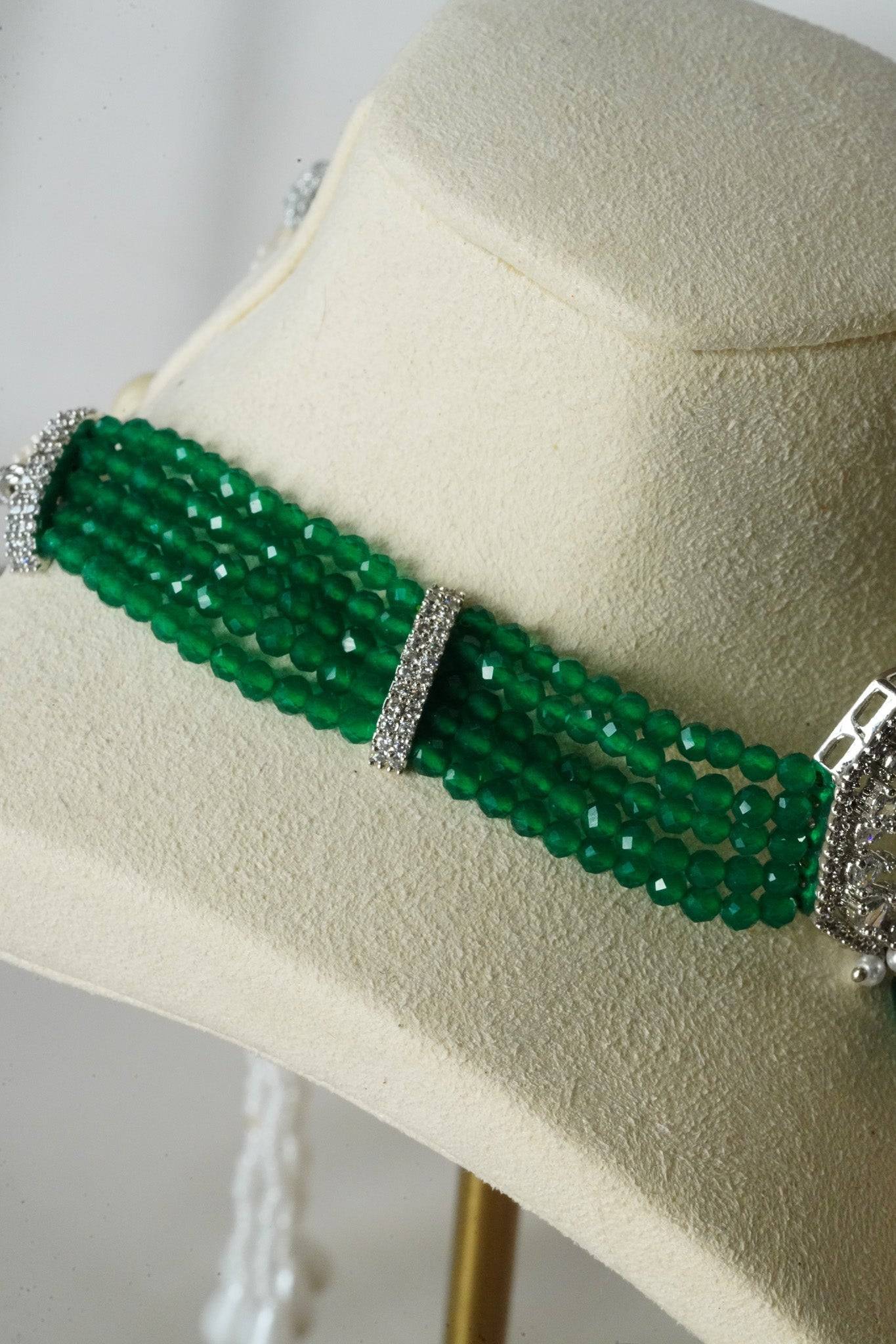 Jhanvi Choker Necklace Set - Silver & Gem Variations featuring cushion-cut AD stones with green teardrop accents, includes matching earrings.
