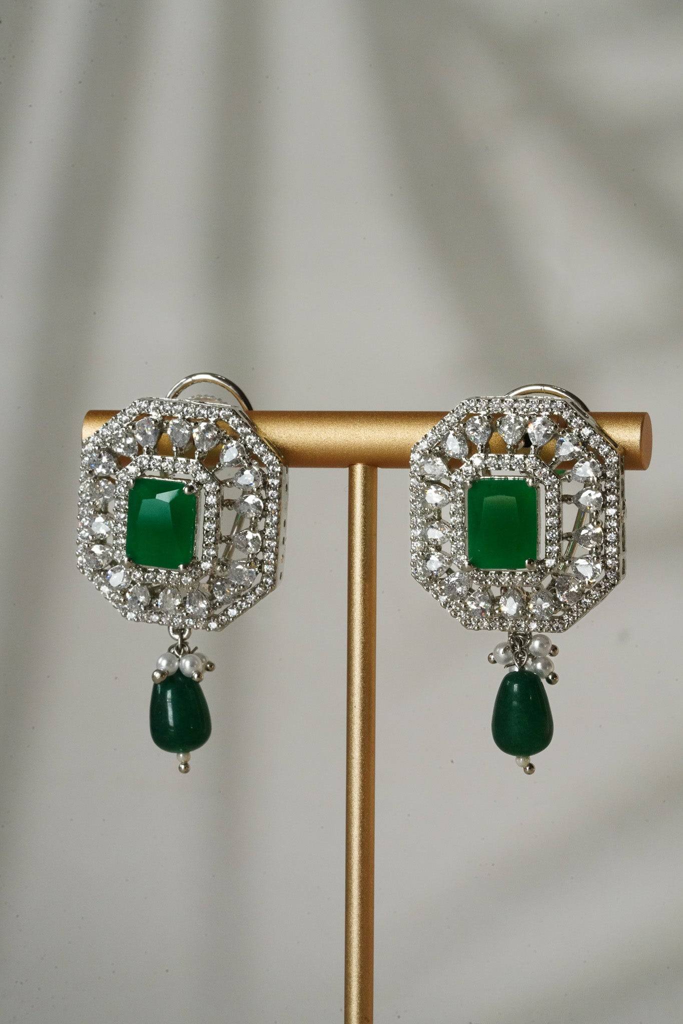 Jhanvi Choker Necklace Set - Silver & Gem Variations featuring cushion-cut AD stones with green teardrop accents, includes matching earrings.