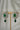Jhanvi Choker Necklace Set - Silver & Gem Variations featuring cushion-cut AD stones with green teardrop accents, includes matching earrings.
