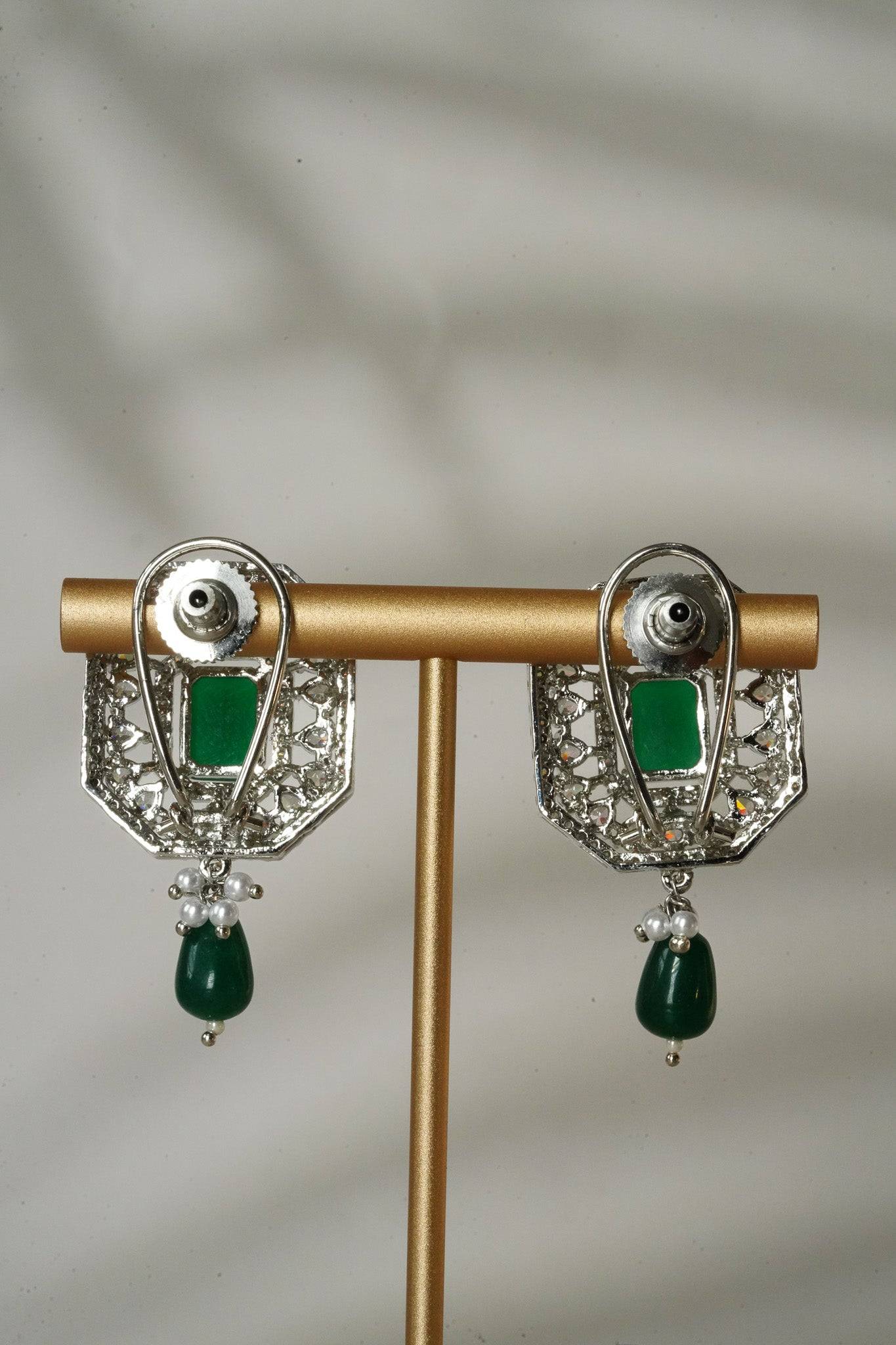 Jhanvi Choker Necklace Set - Silver & Gem Variations featuring cushion-cut AD stones with green teardrop accents, includes matching earrings.