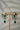 Jhanvi Choker Necklace Set - Silver & Gem Variations featuring cushion-cut AD stones with green teardrop accents, includes matching earrings.