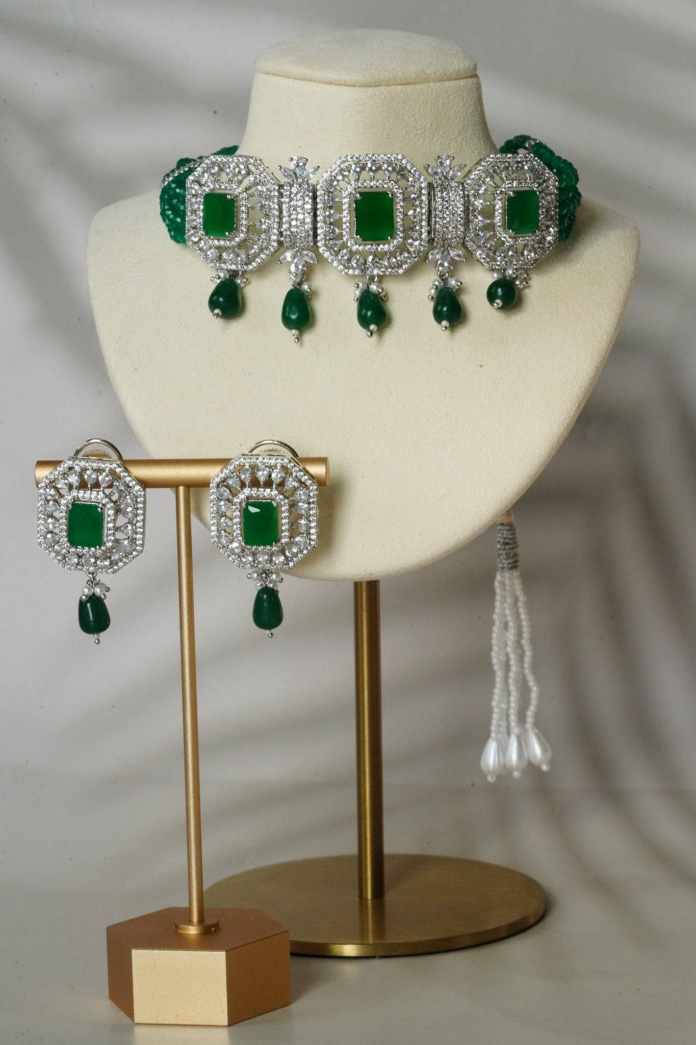 Jhanvi Choker Necklace Set - Silver & Gem Variations featuring cushion-cut AD stones with green teardrop accents, includes matching earrings.