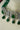Jhanvi Choker Necklace Set - Silver & Gem Variations featuring cushion-cut AD stones with green teardrop accents, includes matching earrings.