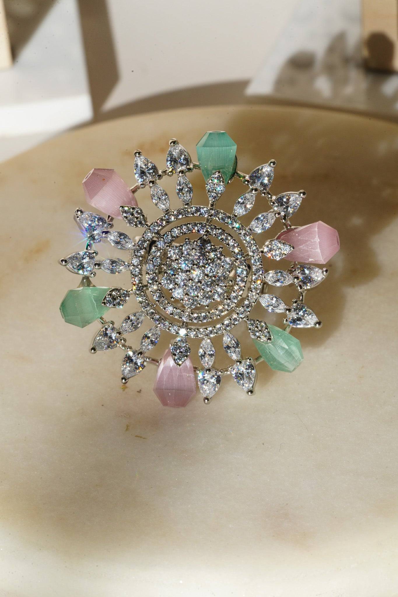 Keya Floral AD Ring - Rhodium-plated with AD stones in silver & ruby, silver & sapphire blue, silver & multicolor, and silver & pink/mint.