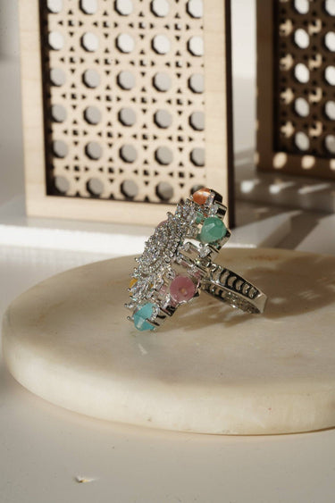 Keya Floral AD Ring - Rhodium-plated with AD stones in silver & ruby, silver & sapphire blue, silver & multicolor, and silver & pink/mint.