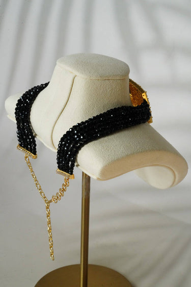 Side view of Luna Chic Choker Set in black with faceted beads and adjustable gold chain, showcasing premium craftsmanship.