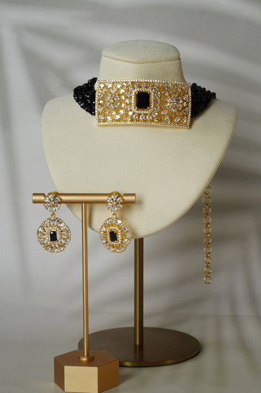Luna Chic Gold-Plated Choker Set in black with crystal-studded centerpiece and matching earrings, ideal for weddings and elegant occasions.