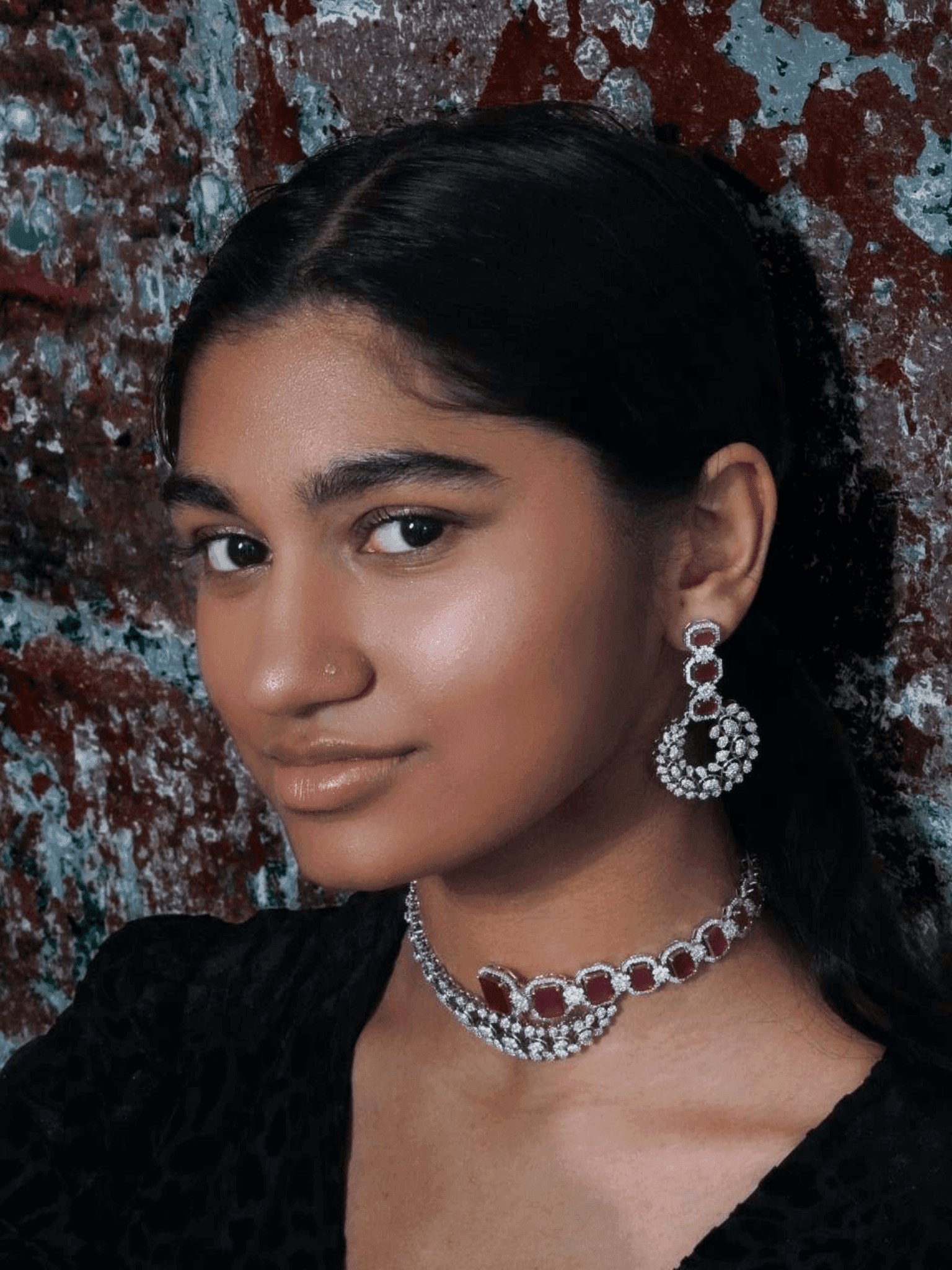 Mahi Asymmetrical Choker Necklace Set - Rhodium-plated with AD stones, available in silver & green, silver & ruby, and silver & sapphire blue, perfect for contemporary elegance.