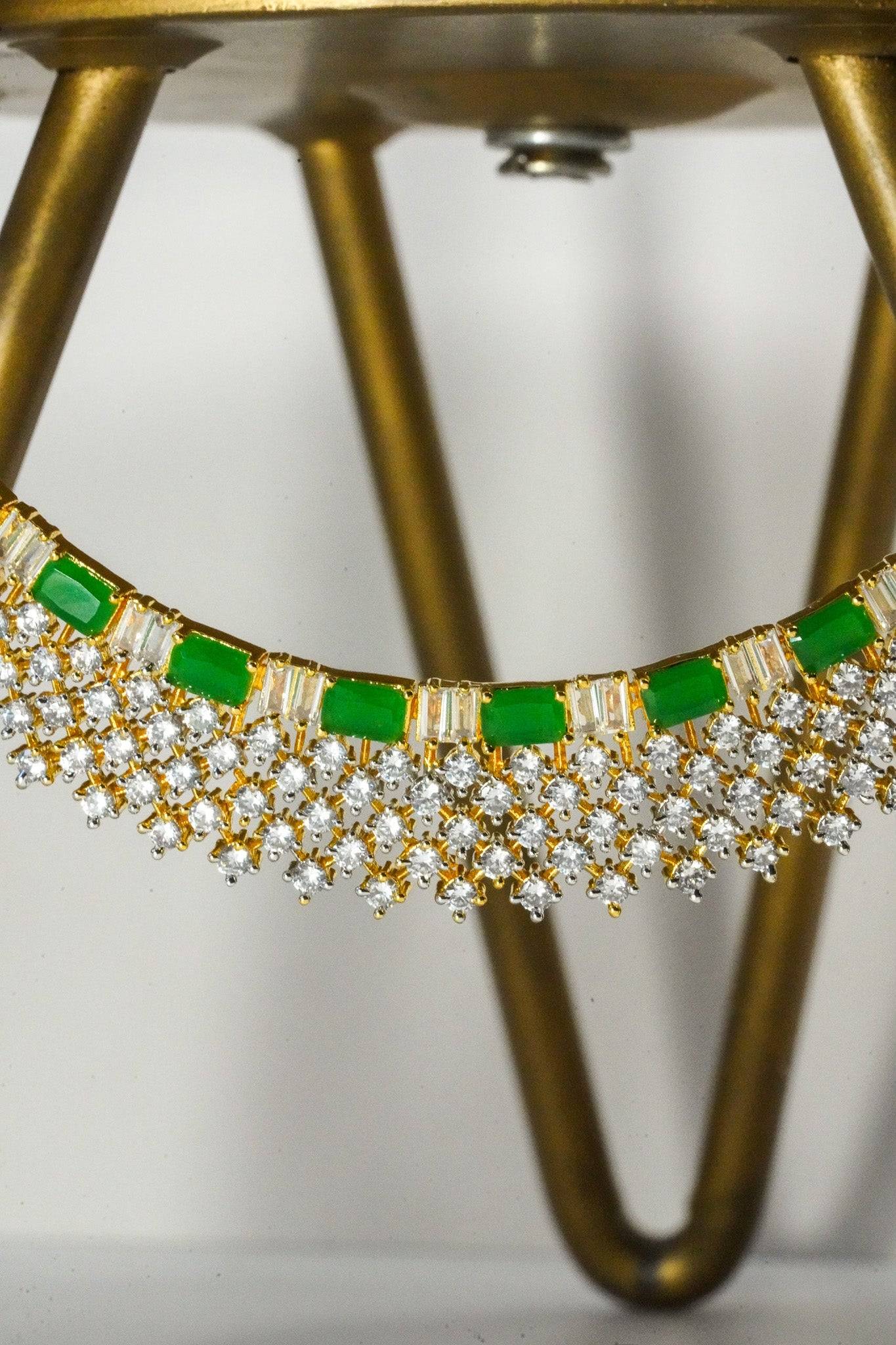 Meghna Diamante Necklace Set - High-quality brass with AD stones, available in gold & green, and gold & dusty pink, includes top-style earrings.