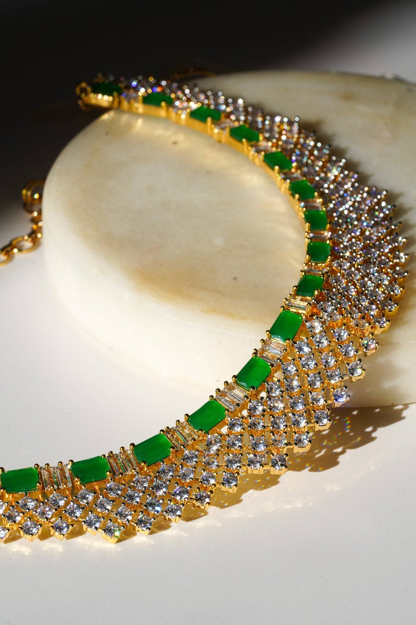 Meghna Diamante Necklace Set - High-quality brass with AD stones, available in gold & green, and gold & dusty pink, includes top-style earrings.