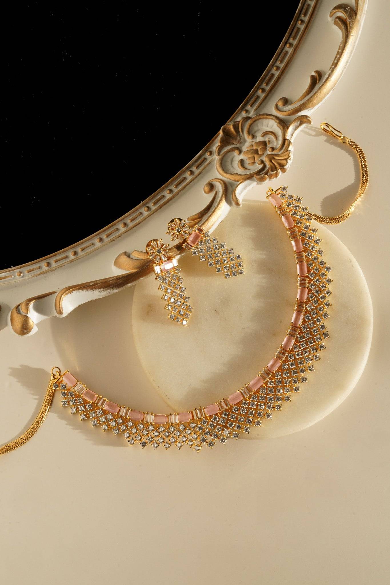 Meghna Diamante Necklace Set - High-quality brass with AD stones, available in gold & green, and gold & dusty pink, includes top-style earrings.