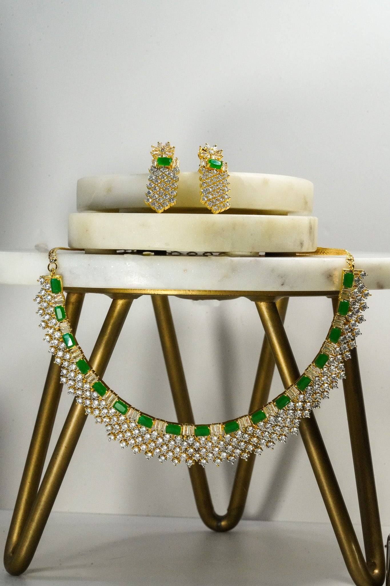 Meghna Diamante Necklace Set - High-quality brass with AD stones, available in gold & green, and gold & dusty pink, includes top-style earrings.