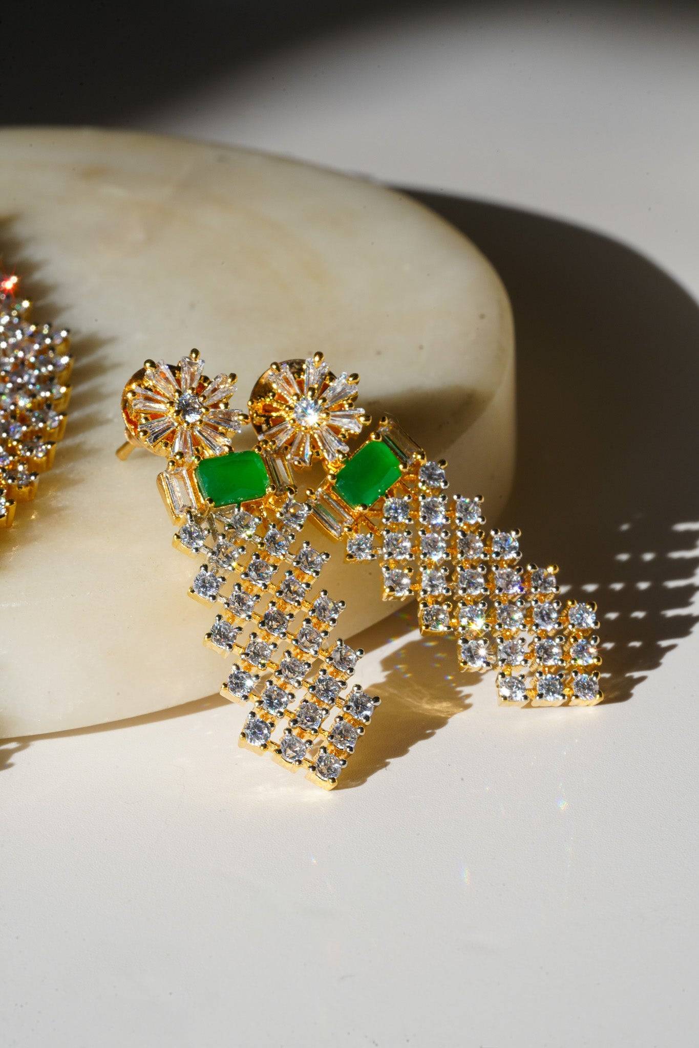 Meghna Diamante Necklace Set - High-quality brass with AD stones, available in gold & green, and gold & dusty pink, includes top-style earrings.
