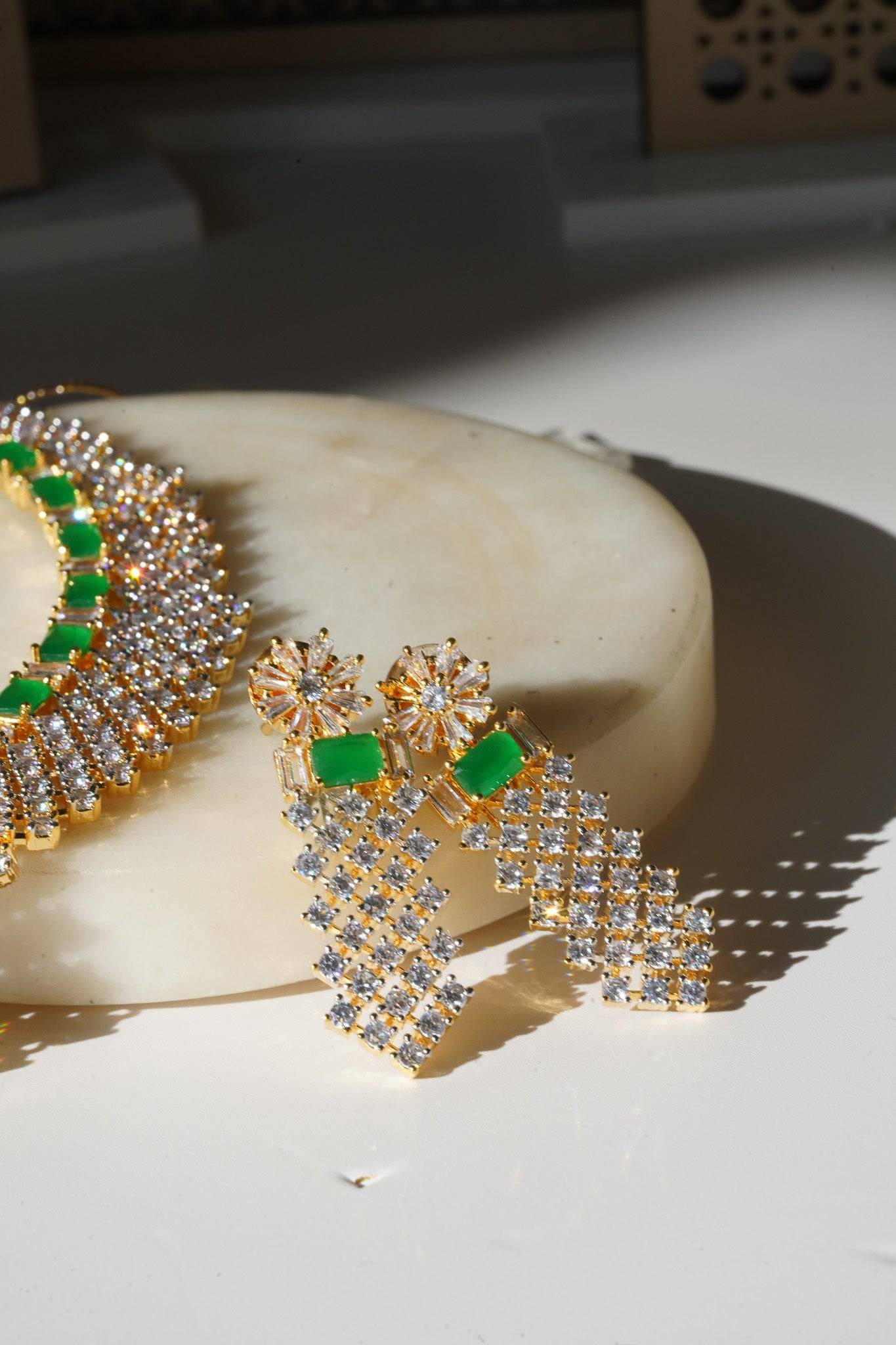 Meghna Diamante Necklace Set - High-quality brass with AD stones, available in gold & green, and gold & dusty pink, includes top-style earrings.