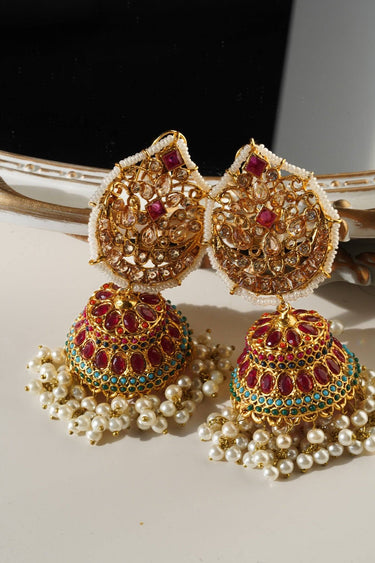 Mishti Jhumkas: Heritage inspired elegant Indian jewelry with ruby red stones, turquoise accents, and pearl drops for festive occasions.