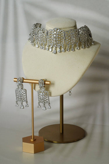 Close-up of Nafisha Silver & AD Stone Choker Set on a display bust with earrings, emphasizing the symmetrical design and sparkle.