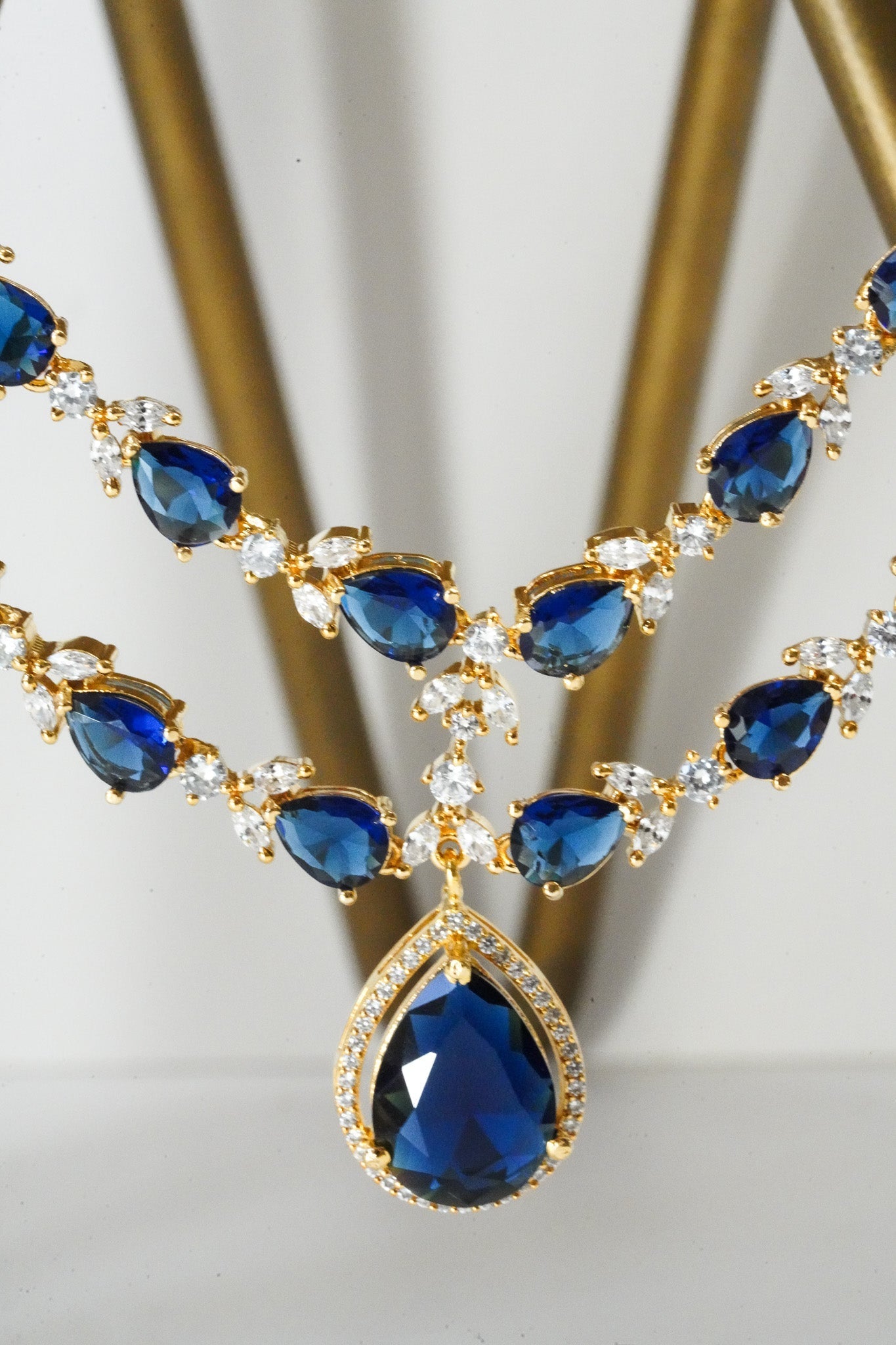 Sapphire blue double layer gold diamanté necklace set for Indian weddings by Inaury