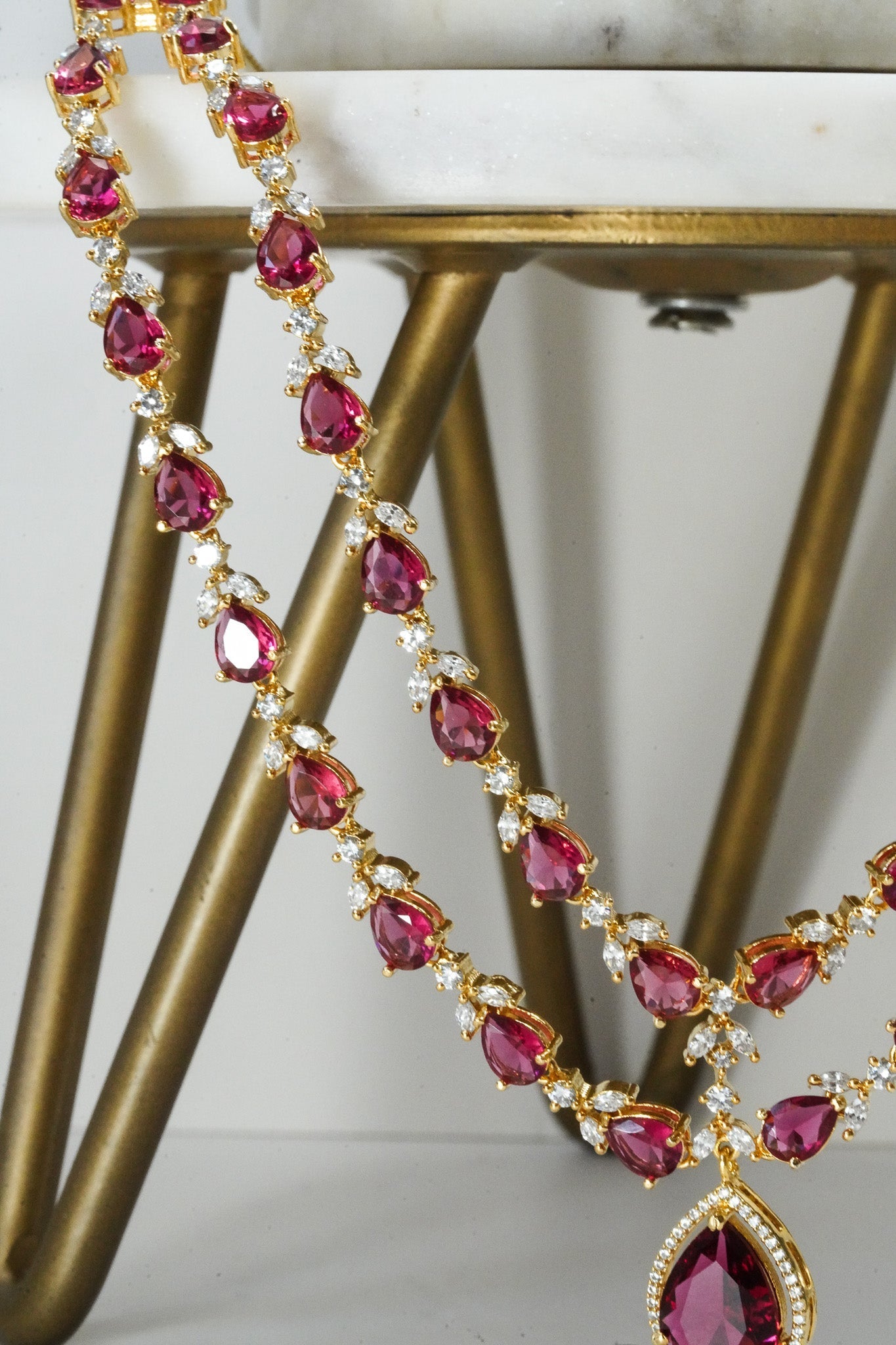 Ruby red double layer gold diamanté necklace set for Indian weddings by Inaury
