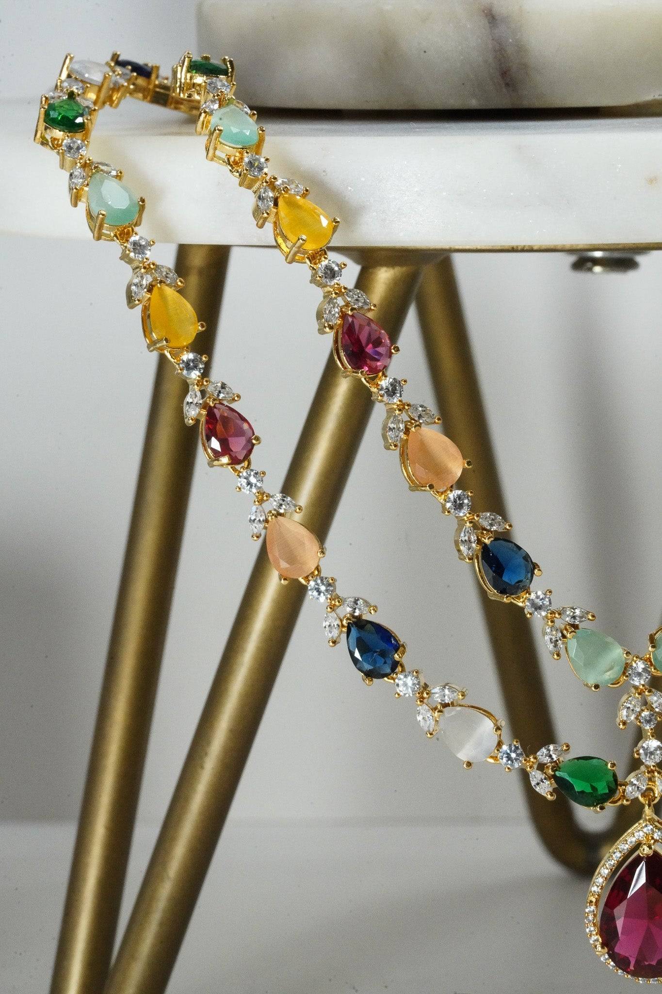 Multicolor double layer gold diamanté necklace set for Indian weddings by Inaury