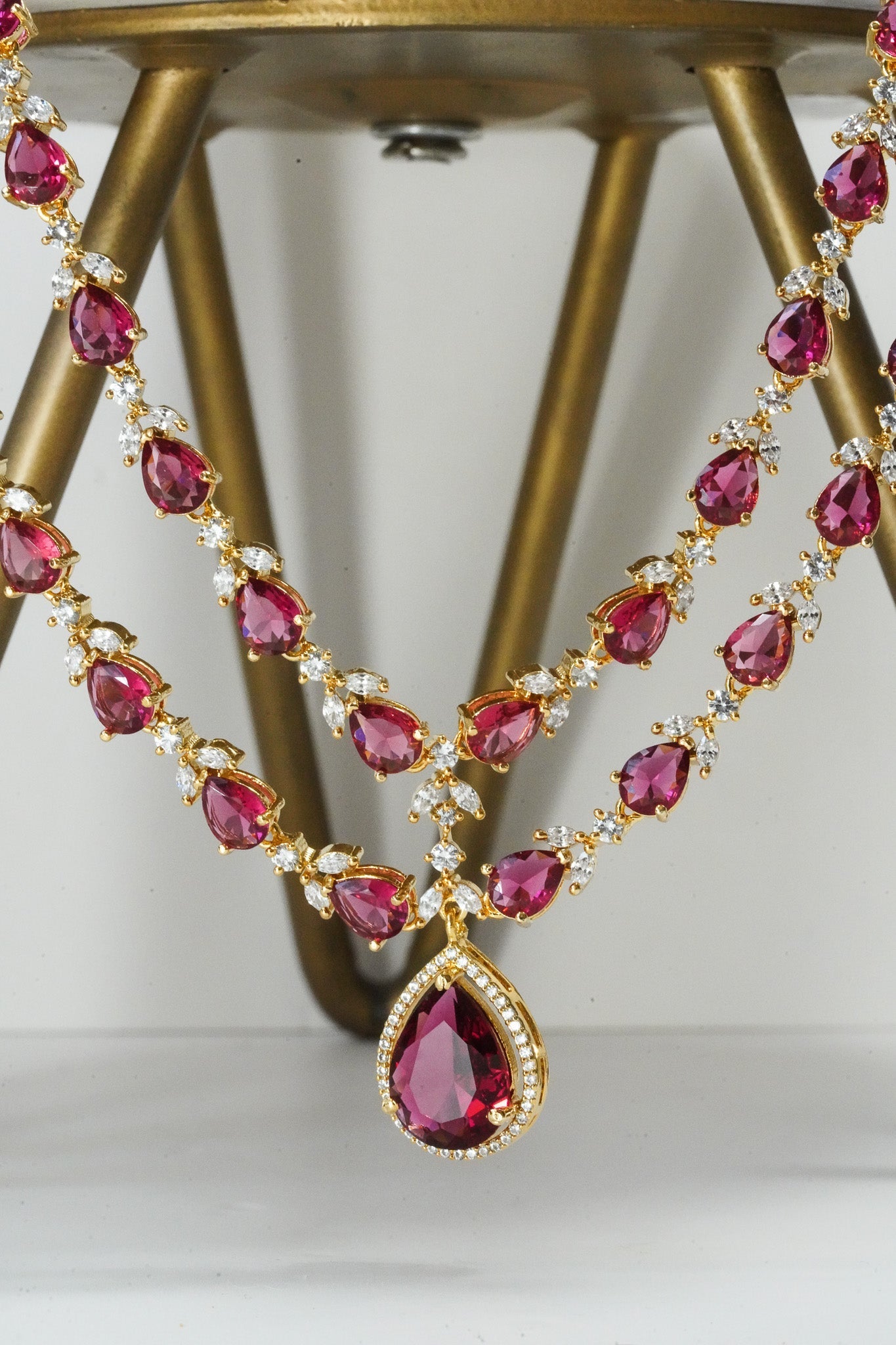 Ruby red double layer gold diamanté necklace set for Indian weddings by Inaury