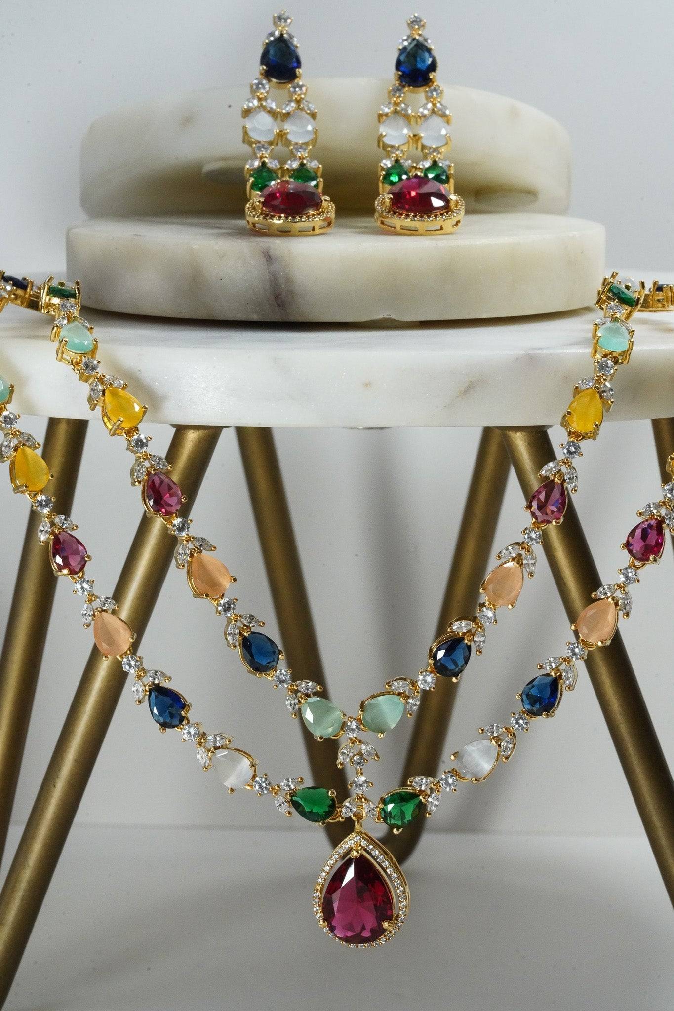 Multicolor double layer gold diamanté necklace set for Indian weddings by Inaury