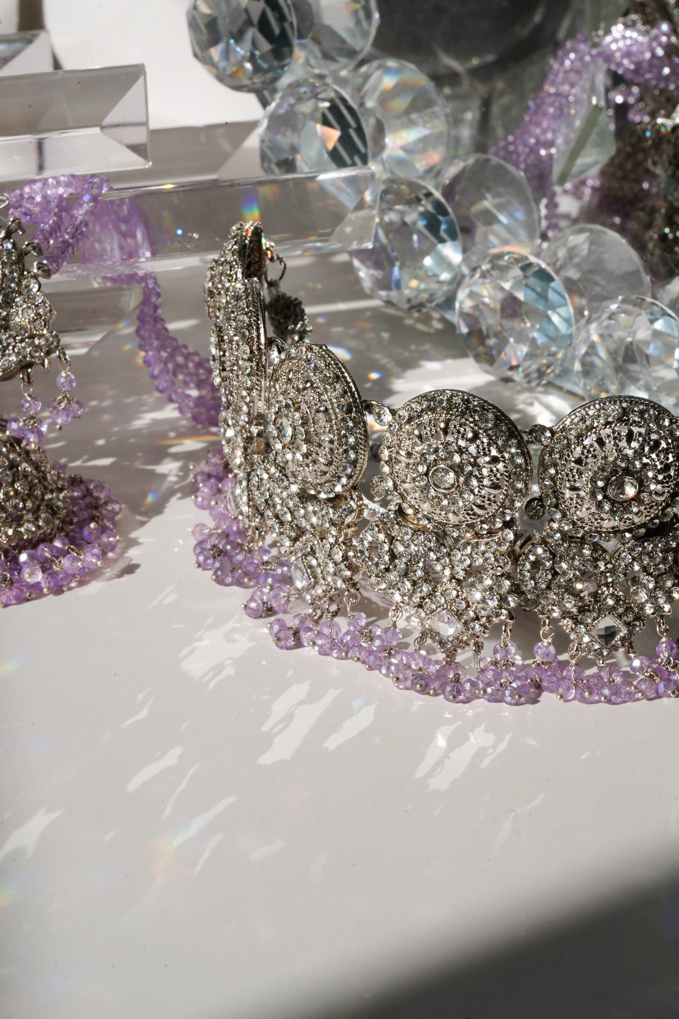 Close-up of lavender beaded choker from Namar Necklace Set with CZ stones, reflecting light beautifully.