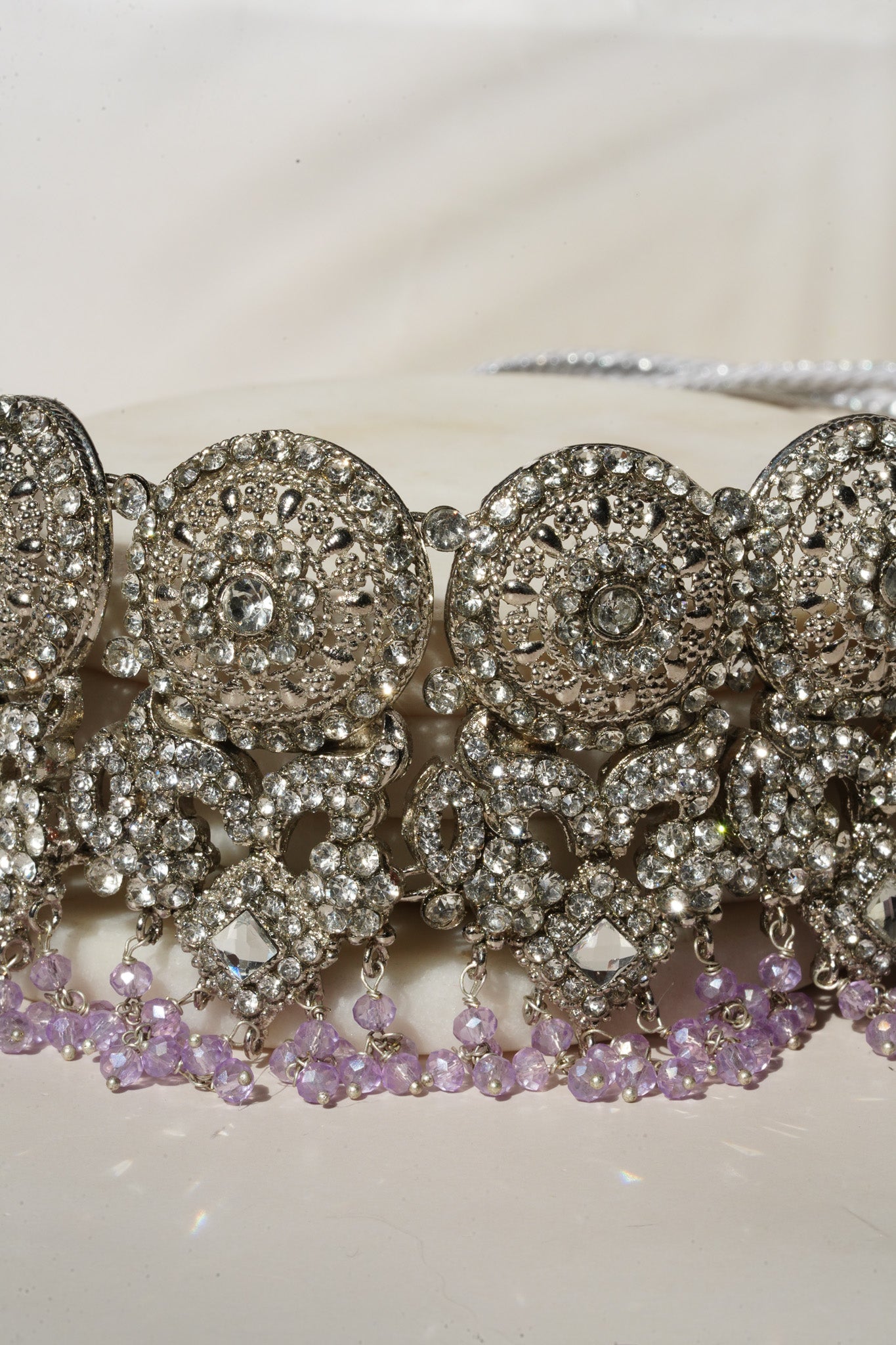 Close-up of lavender beaded choker from Namar Necklace Set with circular CZ motifs and intricate design.