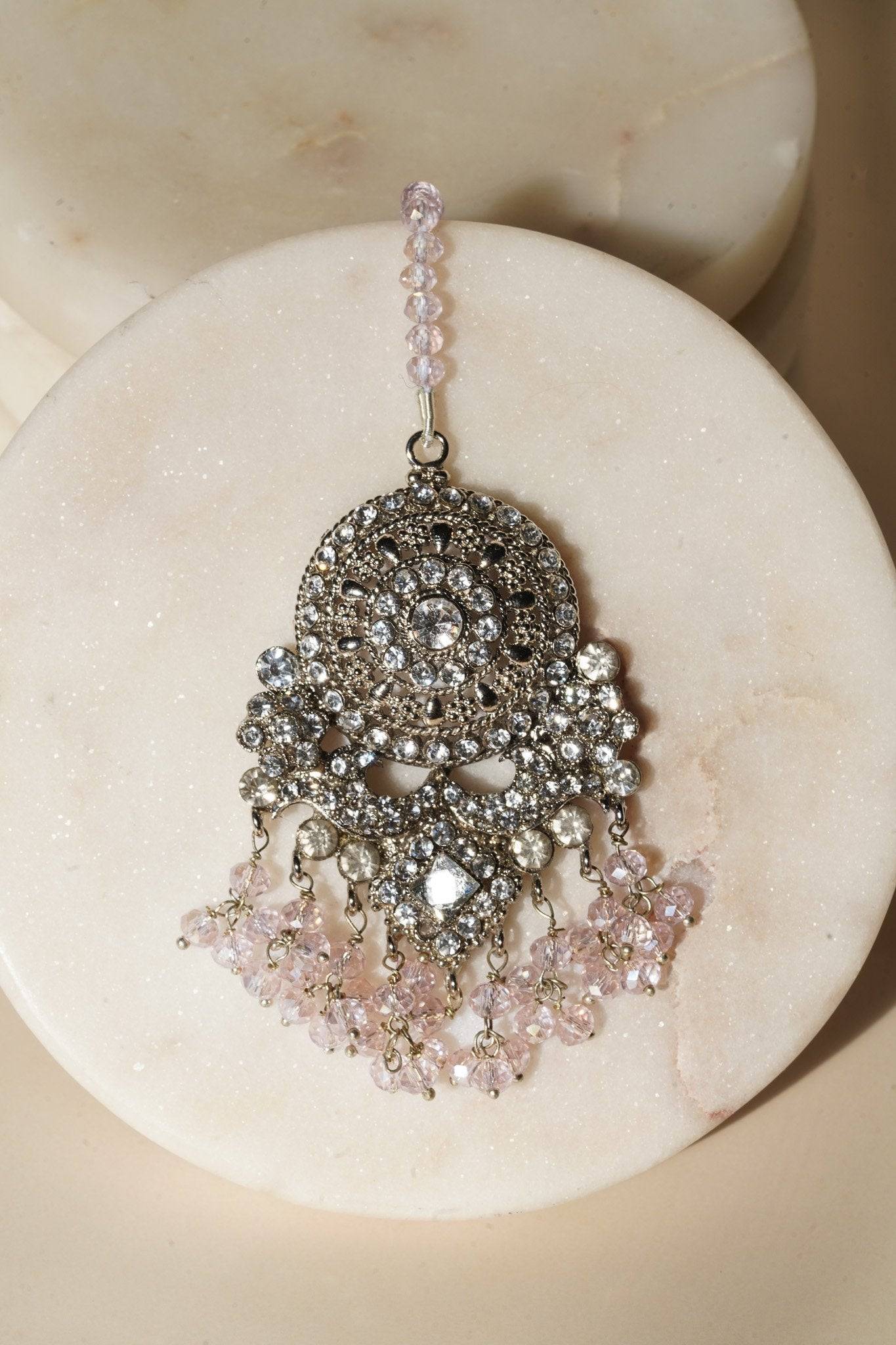 Single earring from Namar Choker Necklace Set with pink beads and intricate silver CZ design.