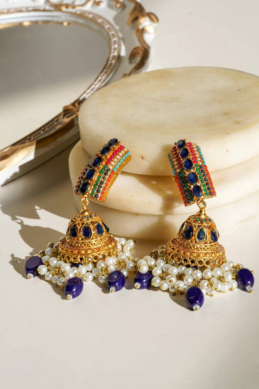 Navdeep Jhumka Earrings - Handcrafted with antique gold plating, available in ruby, blue, or gold, featuring multi-color stones and embellishments.