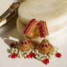 Navdeep Jhumka Earrings - Handcrafted with antique gold plating, available in ruby, blue, or gold, featuring multi-color stones and embellishments.