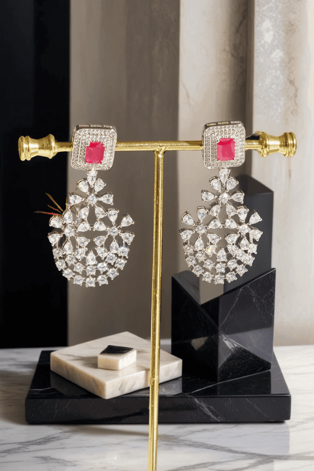 Neha Diamanté Accent Classic Necklace Set - Rhodium-plated with ruby or green accents, floral pattern, curvy layers, and matching 2-inch earrings.