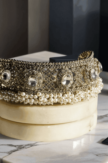 Zoomed-in Rimmie Artisan Crafted Choker Set showing gold filigree and embedded zircon stones with pearl accents.