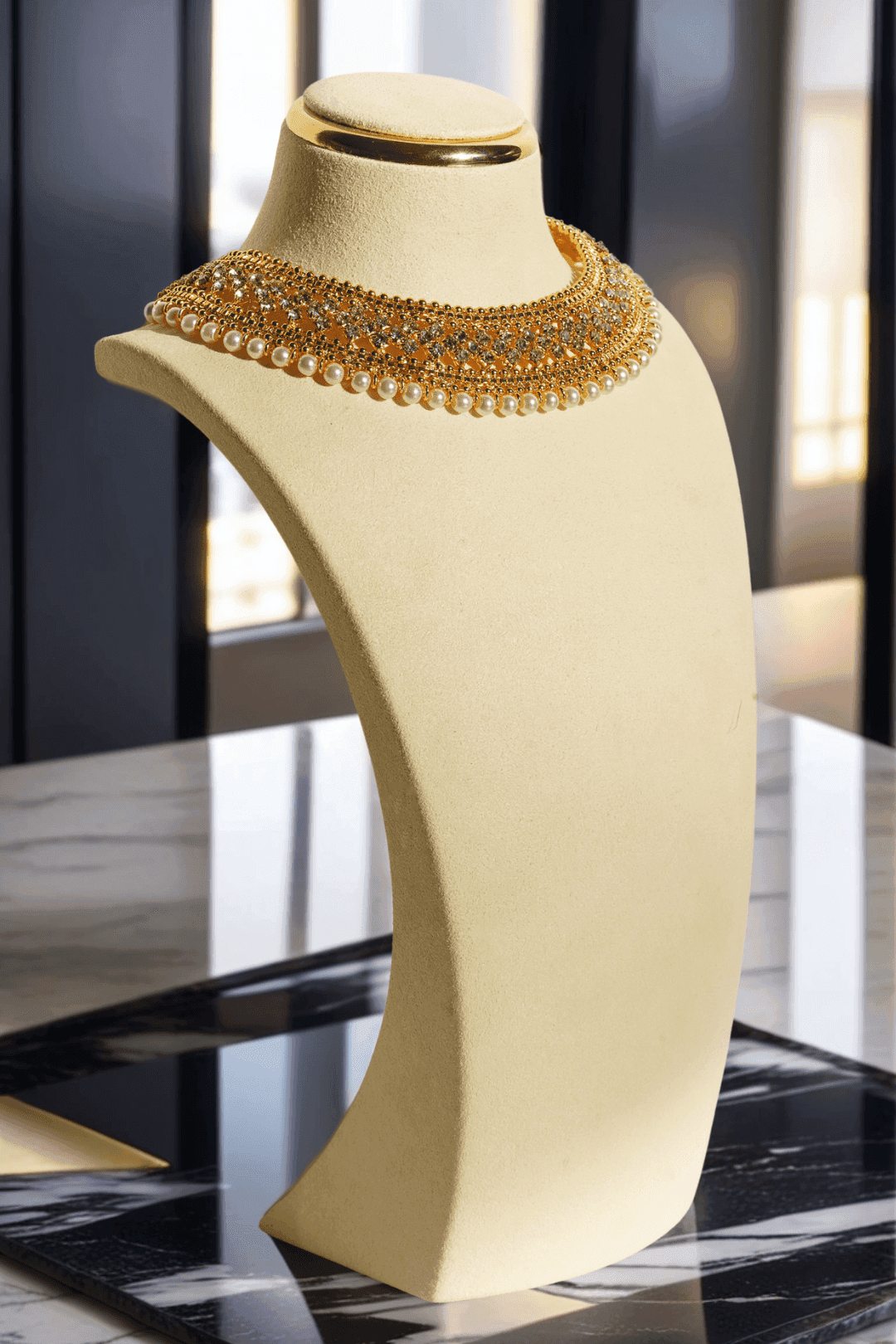Sabhan Classic Necklace Set - Gold-plated with white zircon stones, available in gold & pearl or gold & black, featuring matching oversized stud earrings.