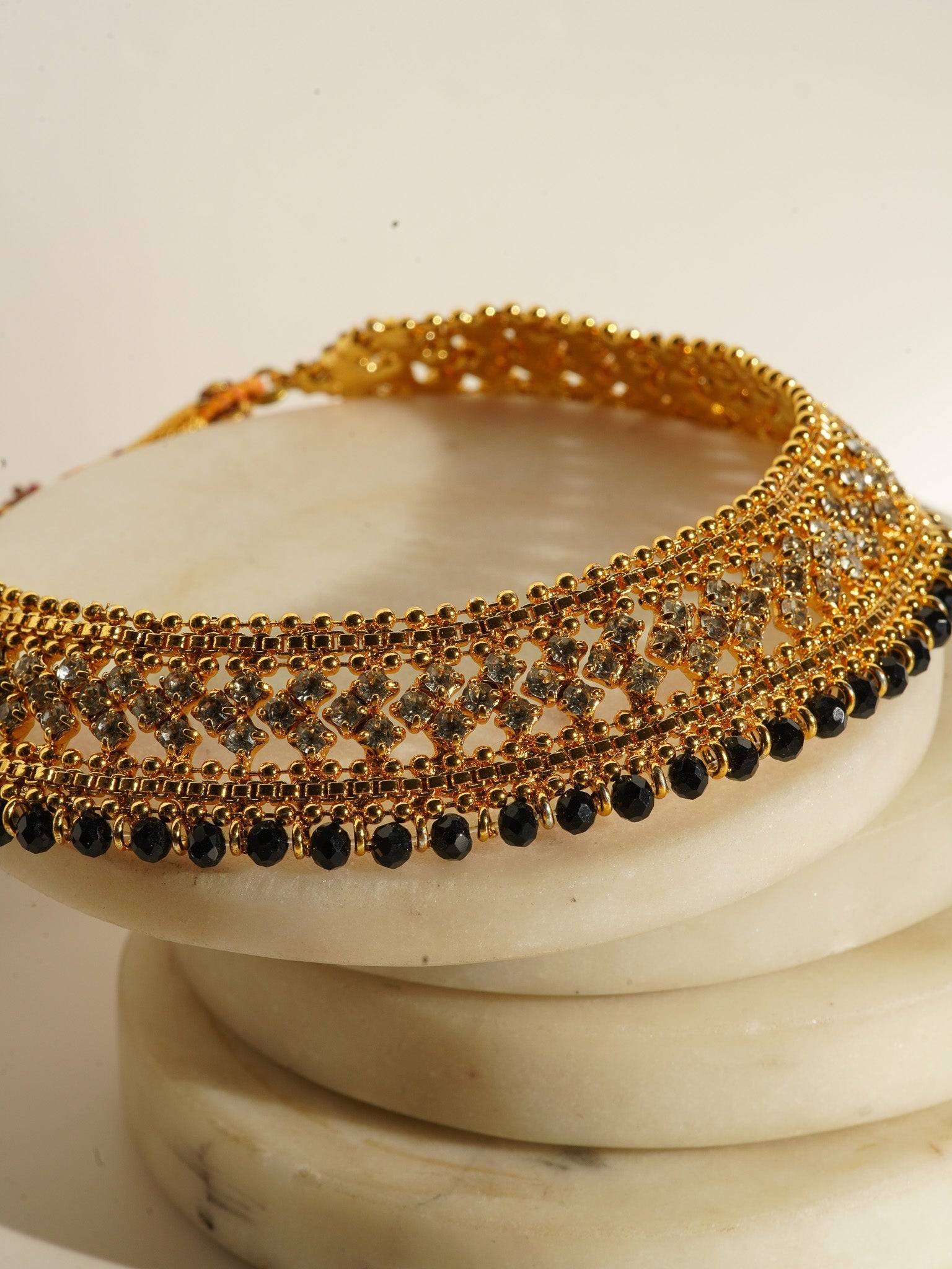 Sabhan Classic Necklace Set - Gold-plated with white zircon stones, available in gold & pearl or gold & black, featuring matching oversized stud earrings.