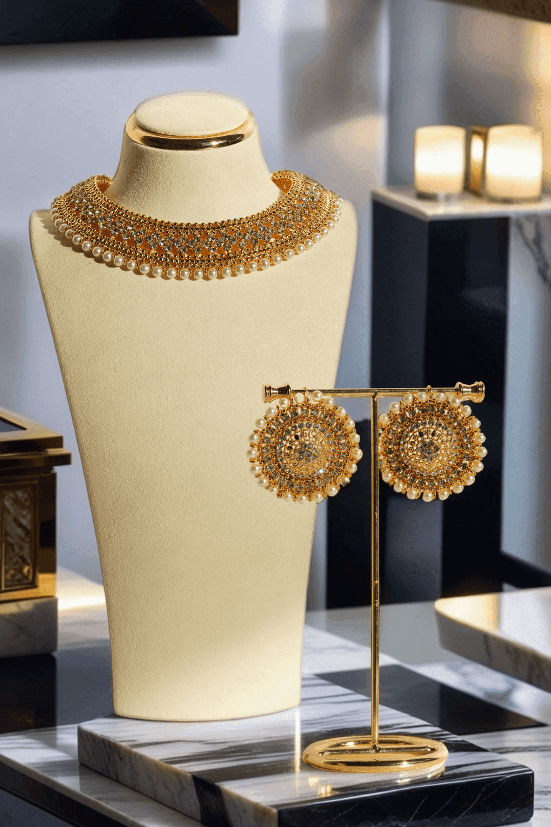 Sabhan Classic Necklace Set - Gold-plated with white zircon stones, available in gold & pearl or gold & black, featuring matching oversized stud earrings.