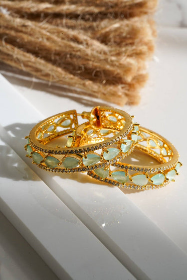 Saira Diamanté Accent AD Hoops - Gold-plated hoop earrings with white or mint green AD stones, measuring 1.54 inches in height and 0.35 inches in width.