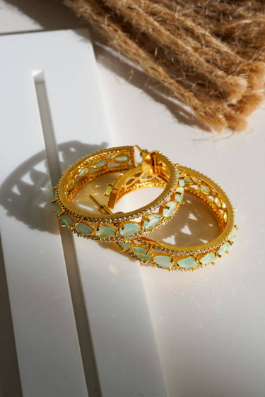 Saira Diamanté Accent AD Hoops - Gold-plated hoop earrings with white or mint green AD stones, measuring 1.54 inches in height and 0.35 inches in width.