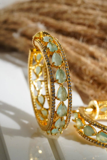 Saira Diamanté Accent AD Hoops - Gold-plated hoop earrings with white or mint green AD stones, measuring 1.54 inches in height and 0.35 inches in width.
