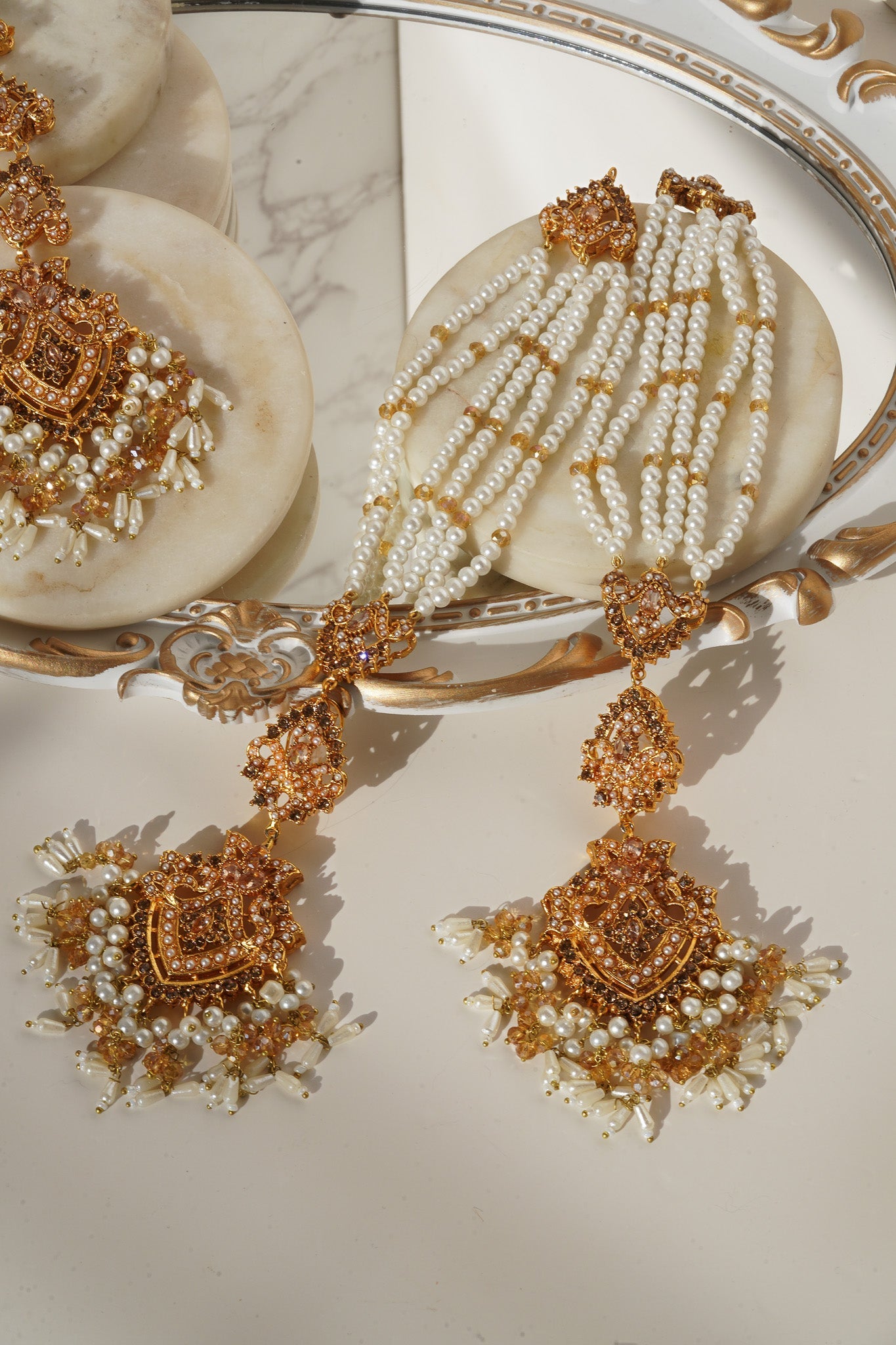 Gold Maang Tikka from Sanjana Set with pearl fringe and ornate detailing, perfect for ethnic and bridal looks.