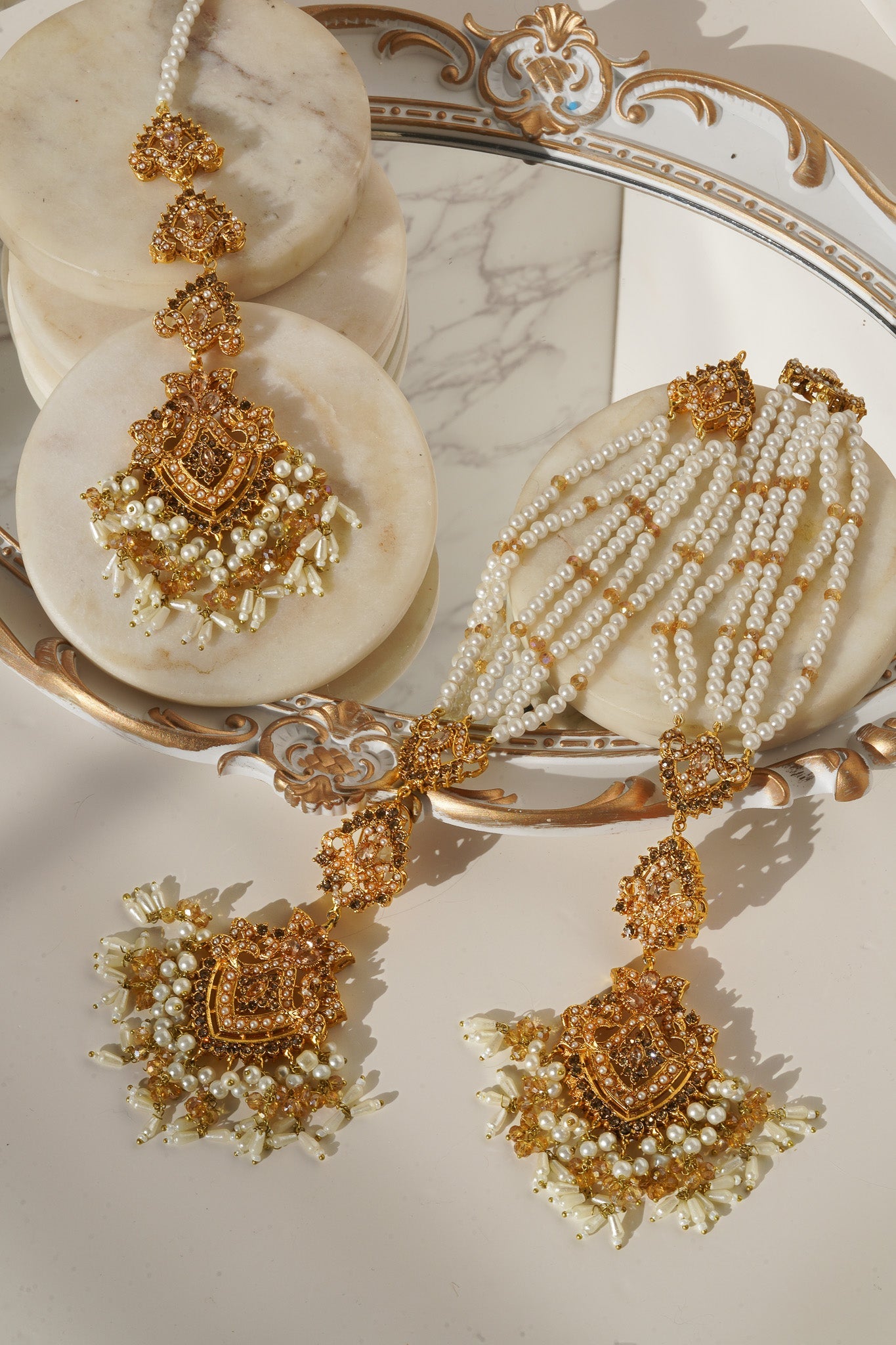 Close-up of pearl strands from Sanjana Set with gold accents, highlighting traditional jewelry craftsmanship.