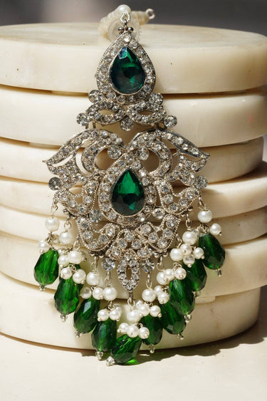 Detailed view of Pakistani Jewelry - Sidra Earrings in silver with green stones and pearl embellishments, oversized chandelier design.