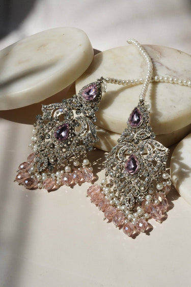 Sidra Chandelier Earrings in silver with lavender CZ stones and pink crystal drops, elegant Pakistani Jewelry for formal occasions.