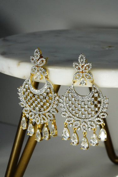 Siya AD Chandbali Earrings - Available in rhodium or gold plating with white AD stones, featuring a 2.5-inch drop, perfect for a statement piece.