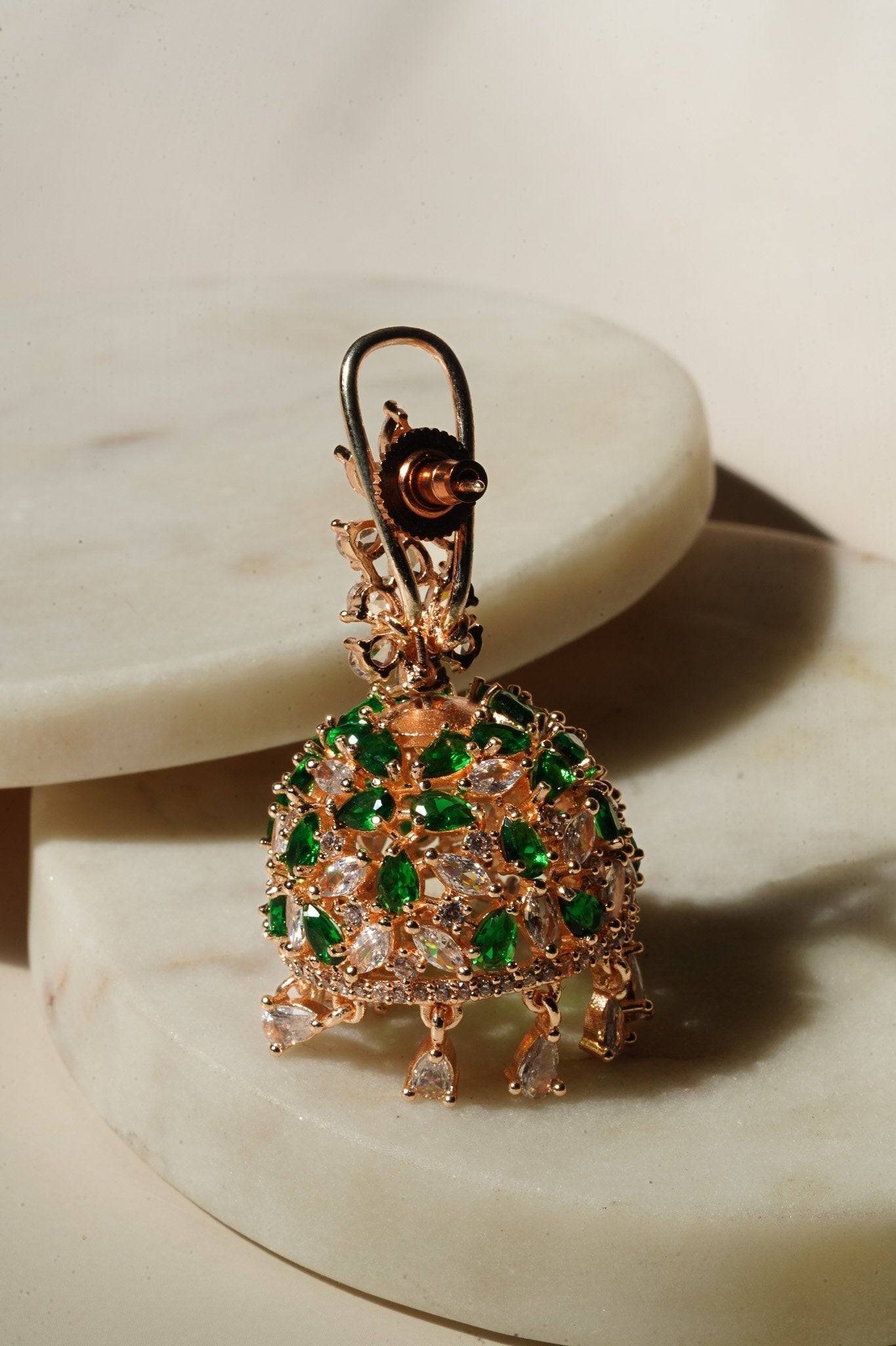 Sneha Floral Jhumka Earrings - Rhodium or rose gold plated, featuring a detailed floral print design, perfect for Western and Indian attire.
