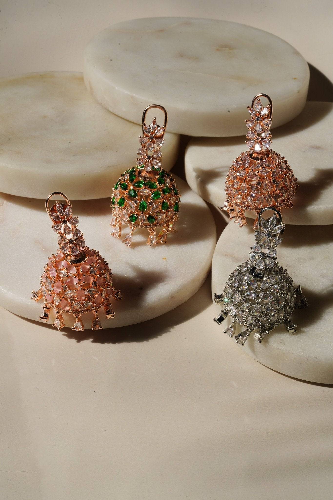 Sneha Floral Jhumka Earrings - Rhodium or rose gold plated, featuring a detailed floral print design, perfect for Western and Indian attire.